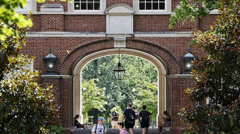Students walk on campus between classes at Miami University Aug. 24, 2022 in Oxford. NICK GRAHAM/STAFF