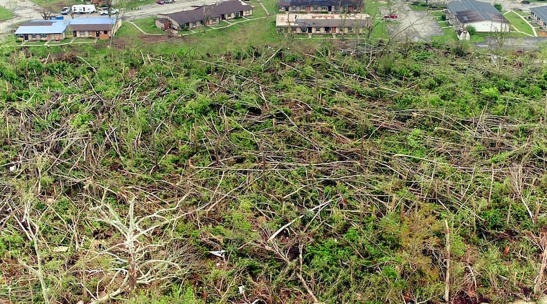 Wooded area between the Foxton Apartments on Shoop Mill Road and the Stillwater River was flattened by the tornado on Memorial Day. TY GREENLEES / STAFF