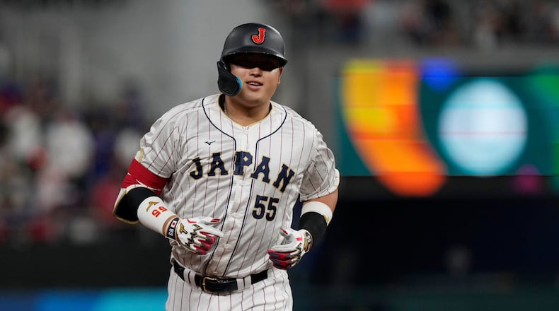 FILE - Japan's Munetaka Murakami rounds the bases after hitting a home run during the second inning of a World Baseball Classic game against the U.S., March 21, 2023, in Miami. (AP Photo/Marta Lavandier, file)