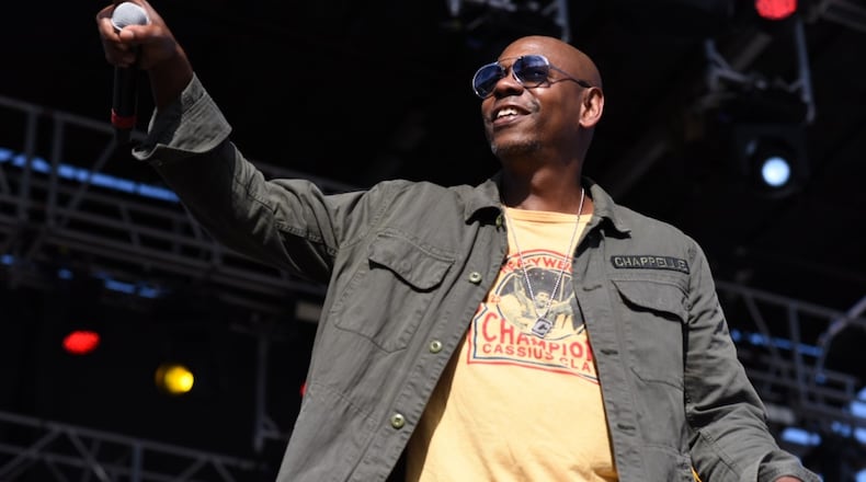 Dave Chappelle on stage for the Gem City Shine event. 
Photo by: Tom Gilliam