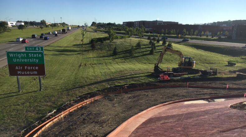 Landscaping work at all four entrance/exit ramps at the Austin Boulevard interchange of I-75 being funded by the Austin Center Joint Economic Development District, a tax-sharing body created by Miami Twp., Miamisburg and Springboro. NICK BLIZZARD