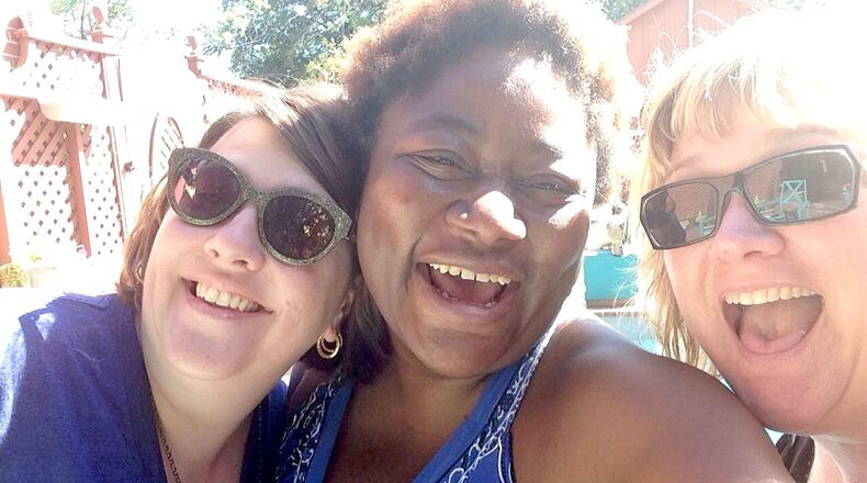 Amelia Robinson, Kristen Wicker and Alexis Larsen credited Cackle, a laughing club.