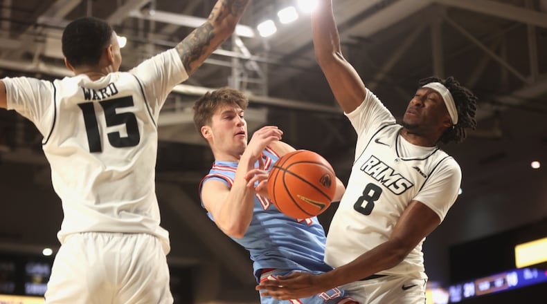 Dayton's Jordan Derkack loses the ball against Virginia Commonwealth on Friday, Feb. 6, 2026, at the Siegel Center in Richmond, Va. David Jablonski/Staff