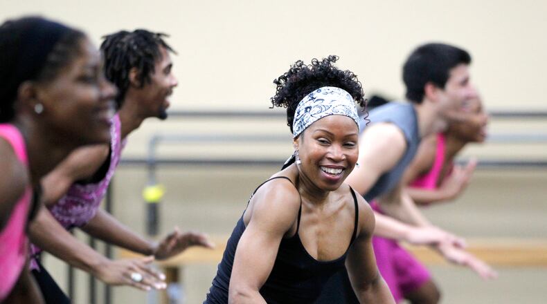 Sheri "Sparkle" Williams rehearses with the Dayton Contemporary Dance Company in their Dayton studio. The company will perform "Etchings," a dance created by female choreographers at the Eichelberger Theatre at Stivers High School for the Arts Saturday Feb. 20 at 7:30 p.m and Sunday Feb. 21 at 3 p.m. LISA POWELL / STAFF
