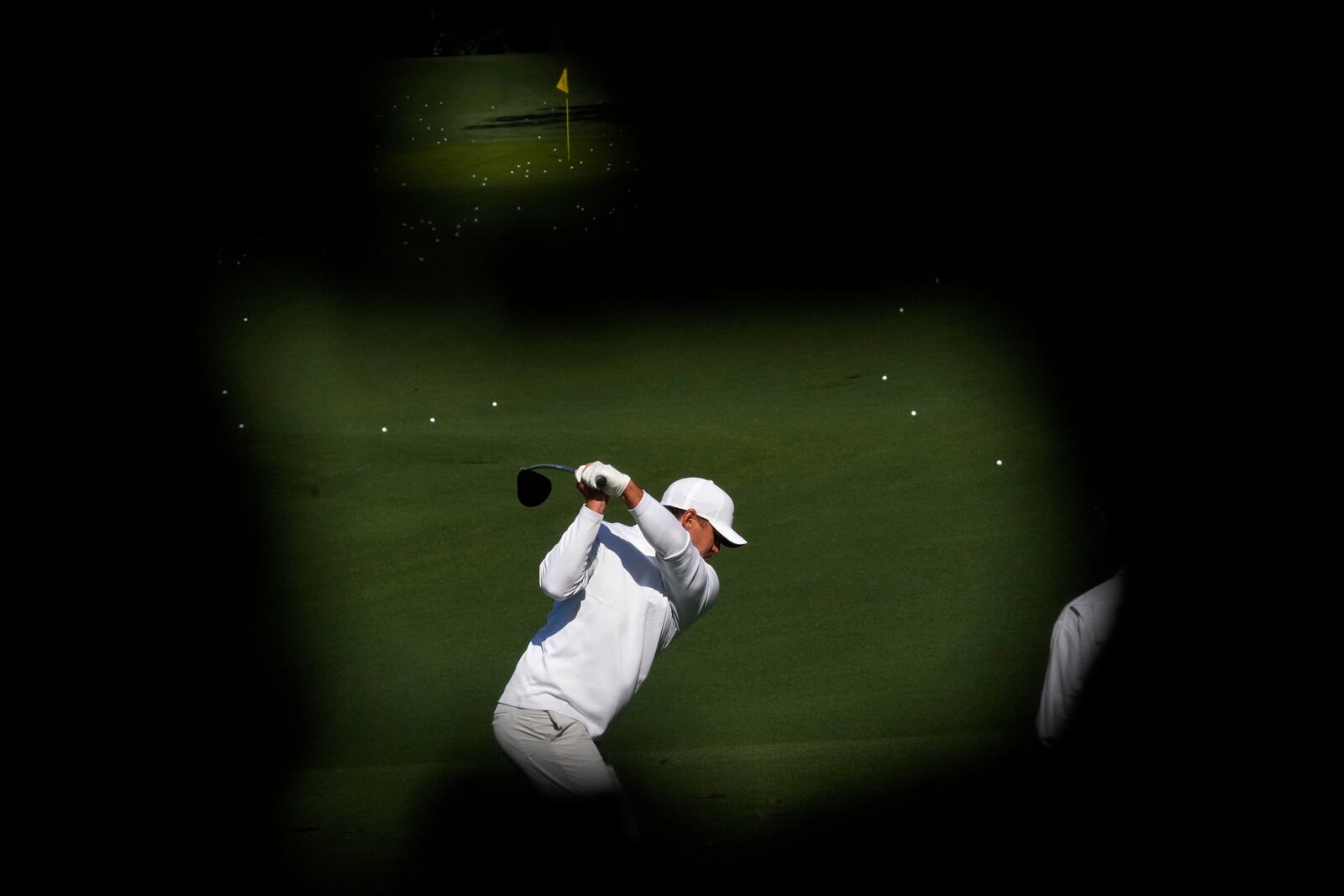 Brooks Koepka hits on the driving range during a practice round at the Masters golf tournament, Tuesday, April 8, 2025, in Augusta, Ga. (AP Photo/George Walker IV)