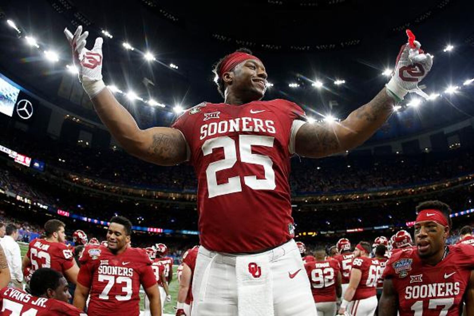 NEW ORLEANS, LA - JANUARY 02: Joe Mixon #25 of the Oklahoma Sooners reacts after a touchdown against the Auburn Tigers during the Allstate Sugar Bowl at the Mercedes-Benz Superdome on January 2, 2017 in New Orleans, Louisiana. (Photo by Jonathan Bachman/Getty Images)
