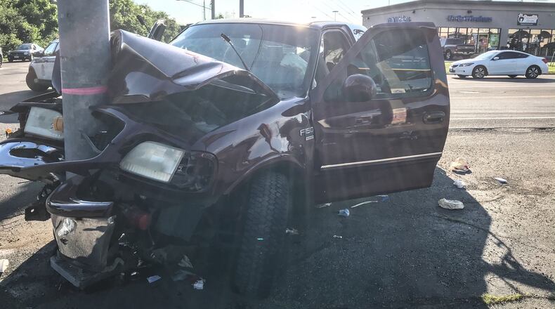 A pickup truck slammed into a pole at the intersection of Philadelphia Drive and West Siebenthaler Avenue Friday, June 12, 2020, in Dayton. JIM NOELKER / STAFF