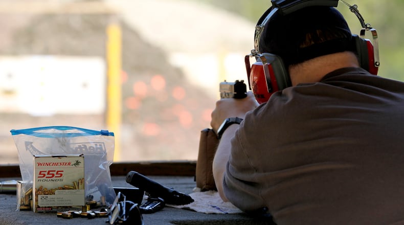 Mark Steiner, from Xenia, shoots his Smith and Wesson at the Middletown Sportsman Club's rifle and pistol range Wednesday, April 18, 2012 in Middletown, Ohio. File photo by Gary Stelzer