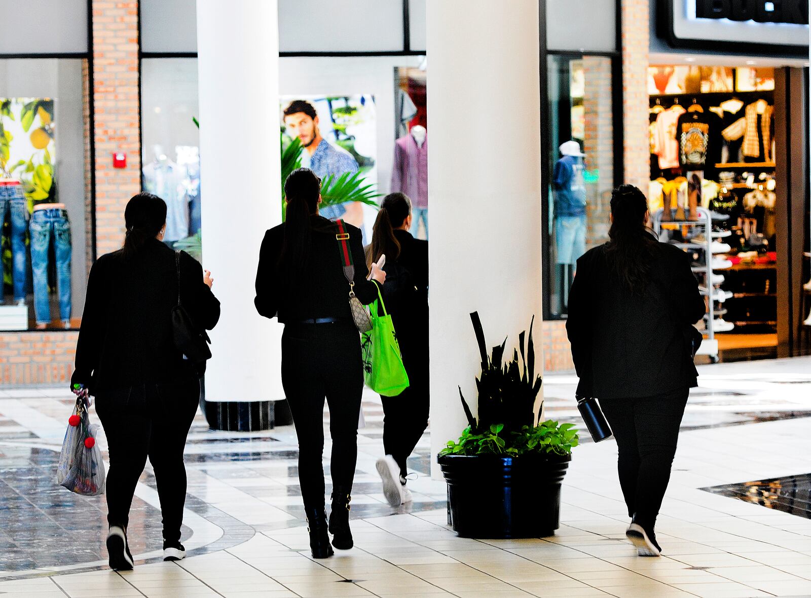 Shoppers at the Mall at Fairfield Commons in Beavercreek Thursday, Feb. 29, 2024. MARSHALL GORBY\STAFF