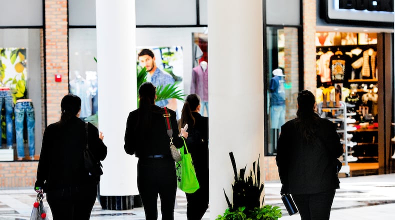 Shoppers at the Mall at Fairfield Commons in Beavercreek Thursday, Feb. 29, 2024. MARSHALL GORBY/STAFF