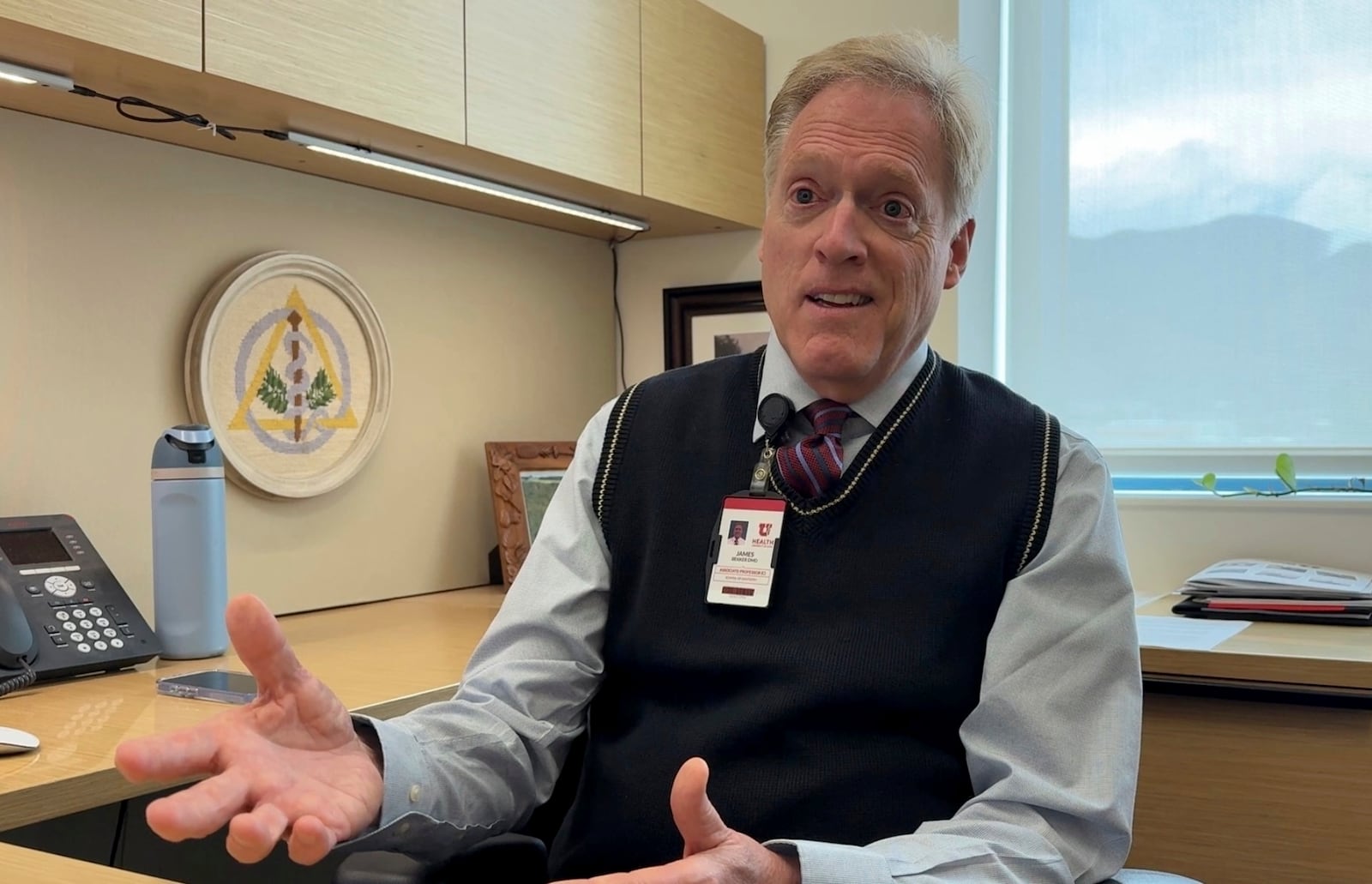 Dr. James Bekker, a dentist in Salt Lake City, explains in an interview on April 30, 2025, how he is preparing his patients and dental students for Utah's first-in-the-nation fluoride ban to take effect May 7, 2025. (AP Photo/Hannah Schoenbaum)