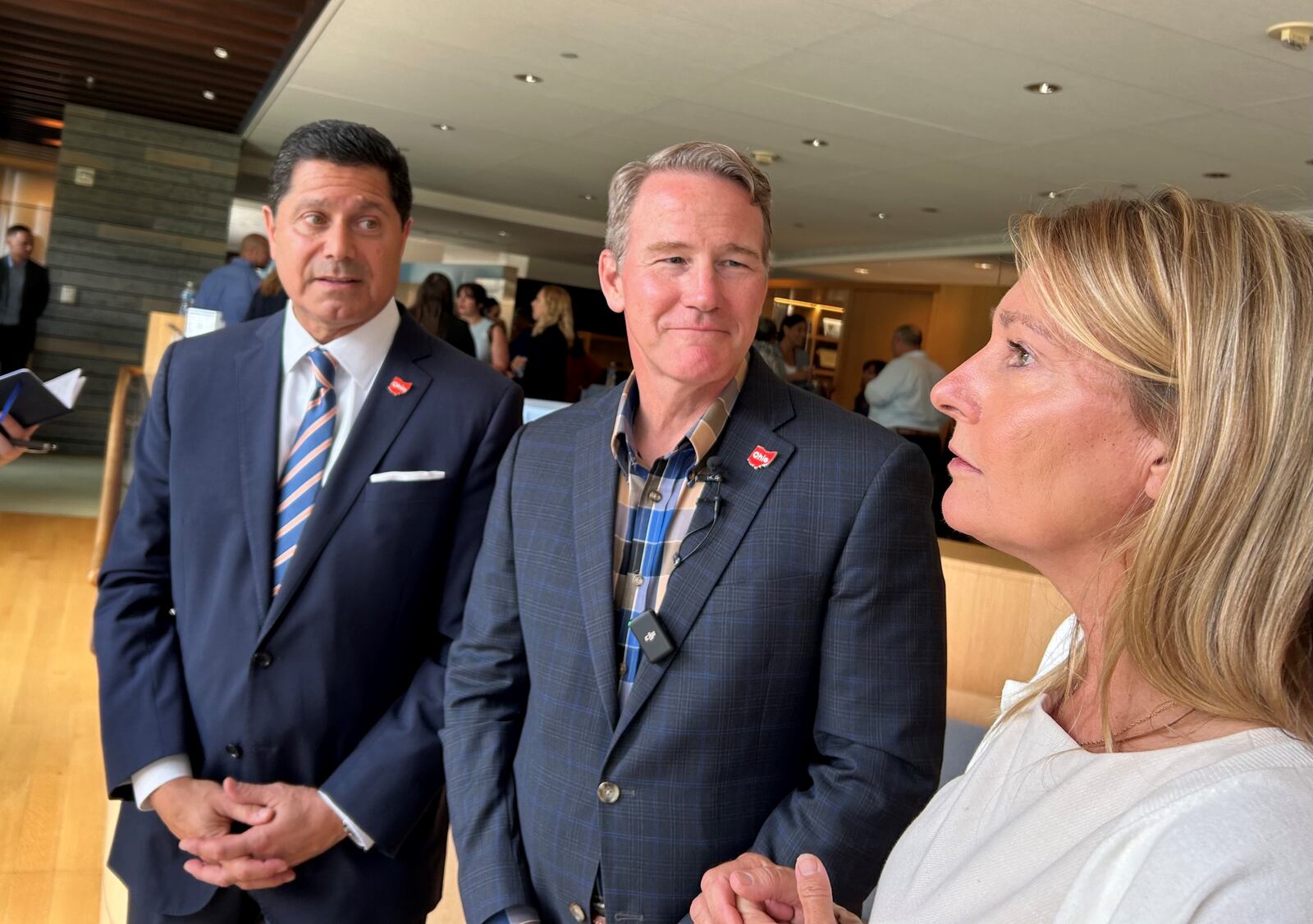 The JobsOhio Small Business Academy, Powered by Aileron was announced on Monday June 17, 2024 in Tipp City. From left are J.P. Nauseef, president and CEO of JobsOhio, Ohio Lt. Gov. Jon Husted and Aileron President Joni Fedders speaking to the media after the news conference. LYNN HULSEY/Staff