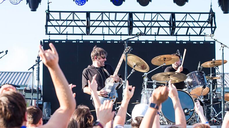 Bryan Scott, lead vocalist and guitarist of the band Sick Puppies, plays during a concert at Summer Fest on July 29 at Wright-Patterson Air Force Base. U.S. AIR FORCE PHOTO/JAIMA FOGG