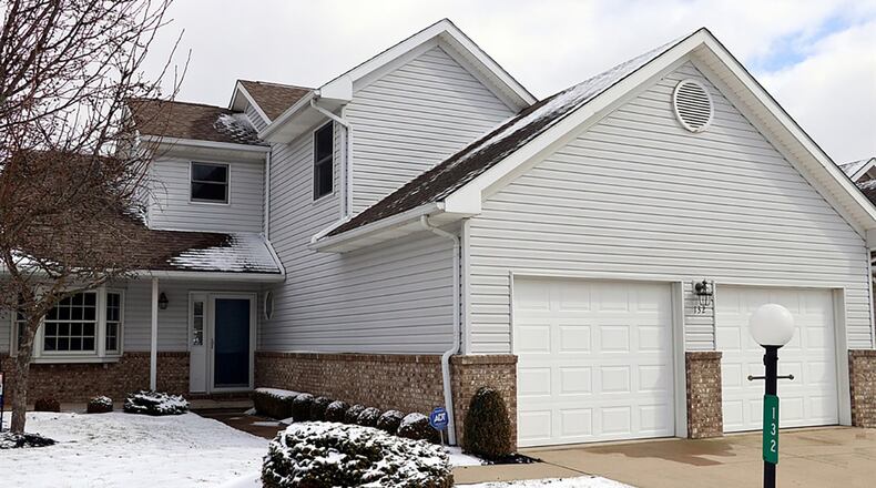 The brick-and-vinyl condominium has about 1,880 sq. ft. of living space. The 2-bedroom townhouse has access to a small clubhouse and swimming pool within the private drive just minutes from downtown Eaton. CONTRIBUTED PHOTOS BY KATHY TYLER