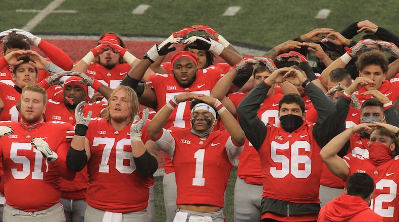 Ohio State sings "Carmen Ohio" after a victory against Indiana on Saturday, Nov. 22, 2020, at Ohio Stadium in Columbus. David Jablonski/Staff