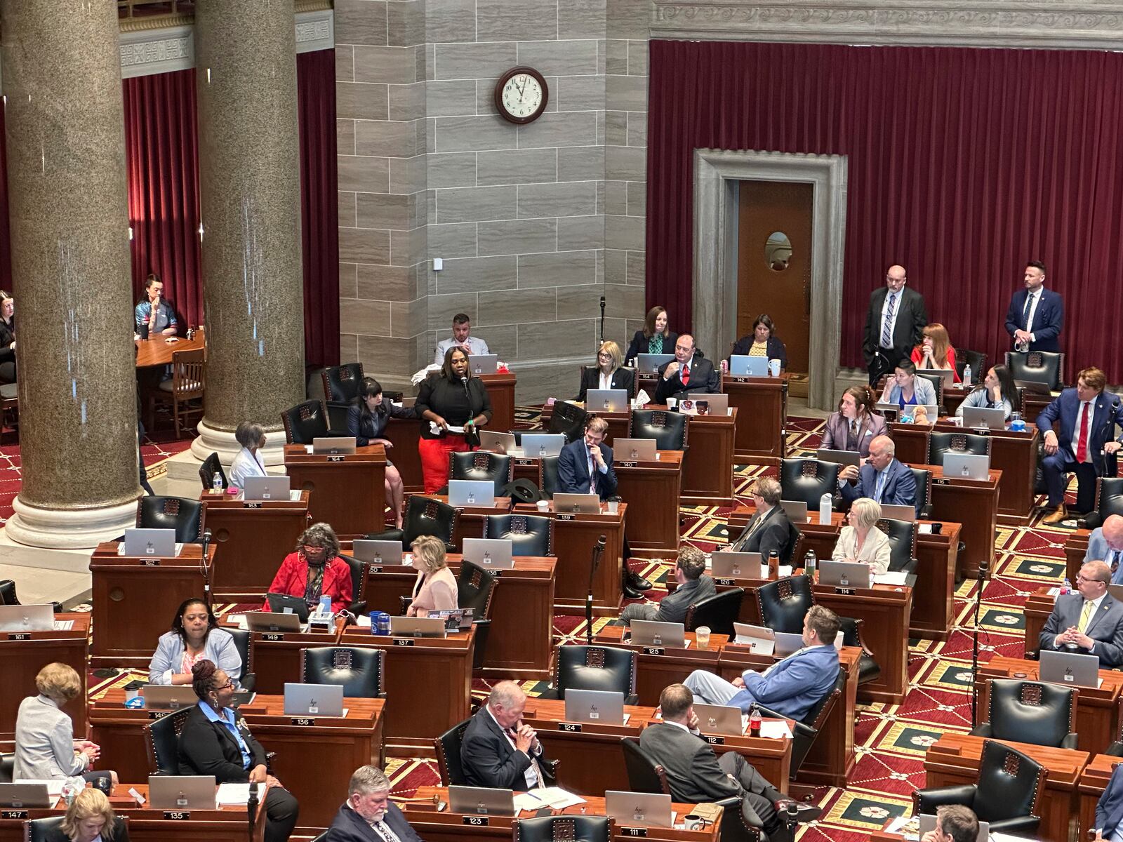 Missouri state Rep. Kimberly-Ann Collins describes for fellow lawmakers gathered in Jefferson City for a special session on Wednesday, June 11, 2025, how she watched a tornado hit her St. Louis home a month earlier. (AP Photo/David A. Lieb)