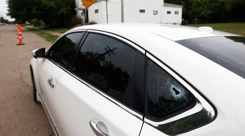 A man is dead Tuesday morning, July 16, 2024, after a shooting at the corner of South Conover and West Fifth streets near an afterhours bar that Dayton Police have had other incidents in the past. MARSHALL GORBY\STAFF