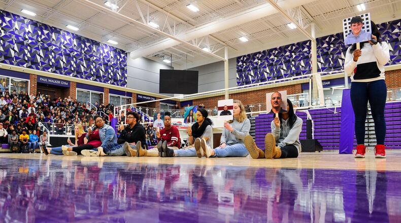Students at Middletown High School participated in events Wednesday, March 14 as part of National Walk Out efforts to commemorate the deaths of 17 students who died from gunfire at a Parkland, Fla. high school. Students filled the Wade E. Miller Arena and 17 students read biographies of those killed in the Parkland school shooting. NICK GRAHAM/STAFF