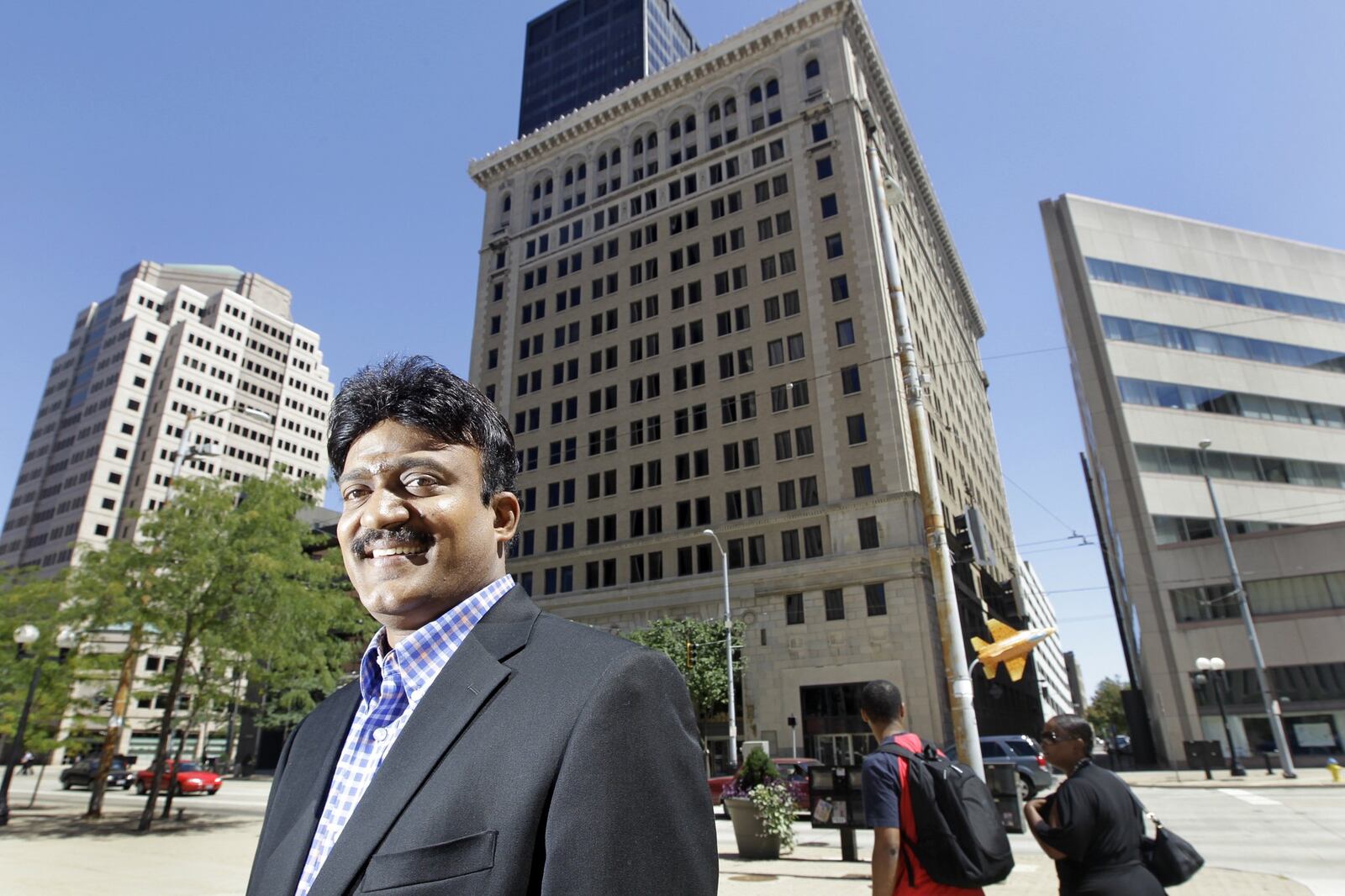 Annamalai Annamalai, also known as Dr. Commander Selvam, stood outside the former Key Bank building in downtown Dayton in August 2010. Montgomery County received a $296,026.41 payout last month to settle back property taxes owed on the property. Annamalai is now in prison following a 27-year sentence in federal court on multiple counts of mail fraud.