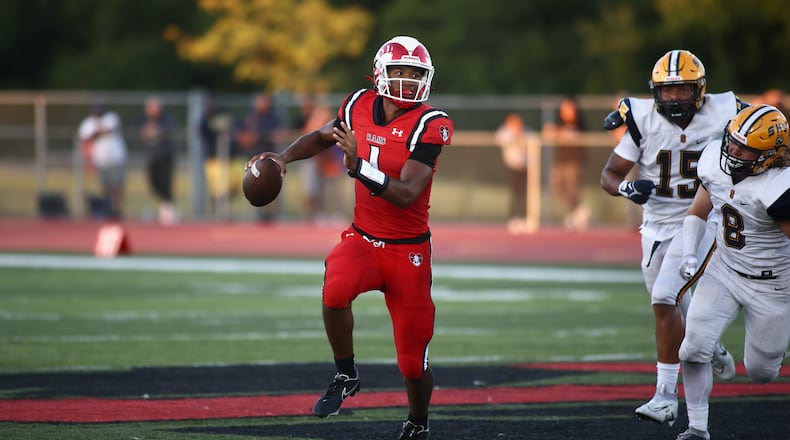Trotwood-Madison's Timothy Carpenter runs for a touchdown in the second quarter against Springfield on Friday, Sept. 1, 2023, in Trotwood. David Jablonski/Staff