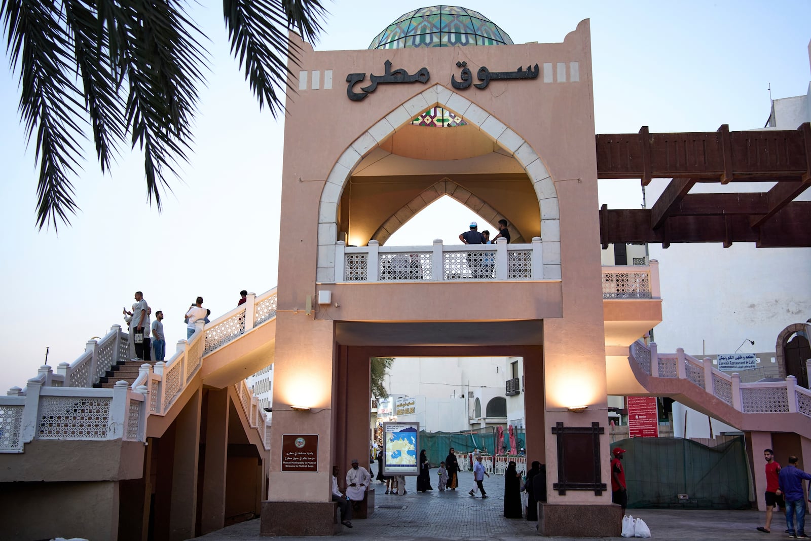 People walk through Mutrah Souq in Muscat, Oman, Friday, April 11, 2025. (AP Photo/ Fatima Shbair)