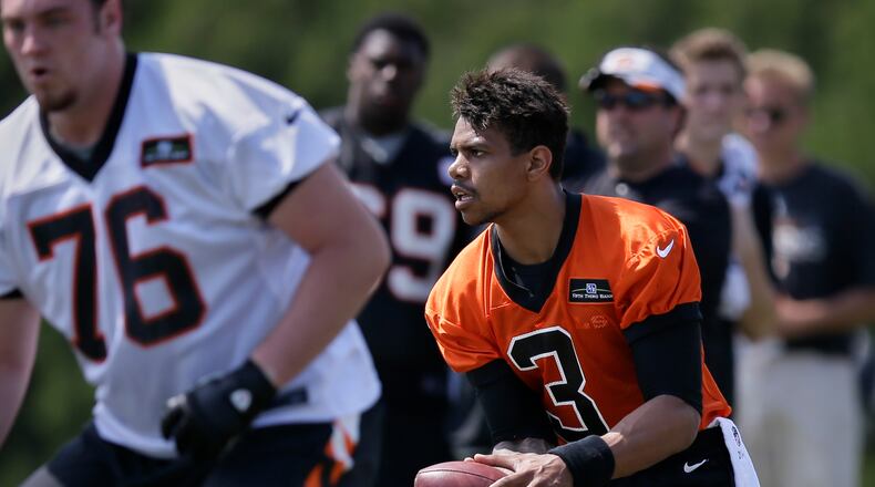 Cincinnati Bengals NFL football quarterback Terrelle Pryor participates in drills during a rookie minicamp in Cincinnati, Friday, May 8, 2015. (AP Photo/John Minchillo)