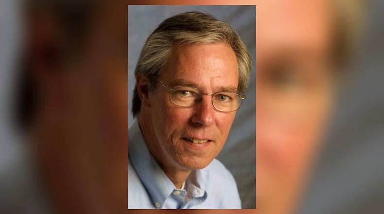 Skip Peterson, former Dayton Daily News chief photographer and editor, died March 16, 2025. CONTRIBUTED.