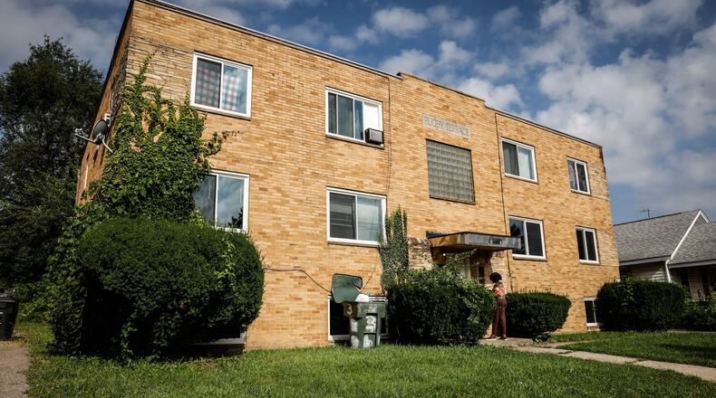 A woman reportedly hit her boyfriend on the head with a hammer and a can of Chef Boyardee before fatally stabbing him on Rugby Road in Dayton. JIM NOELKER/STAFF