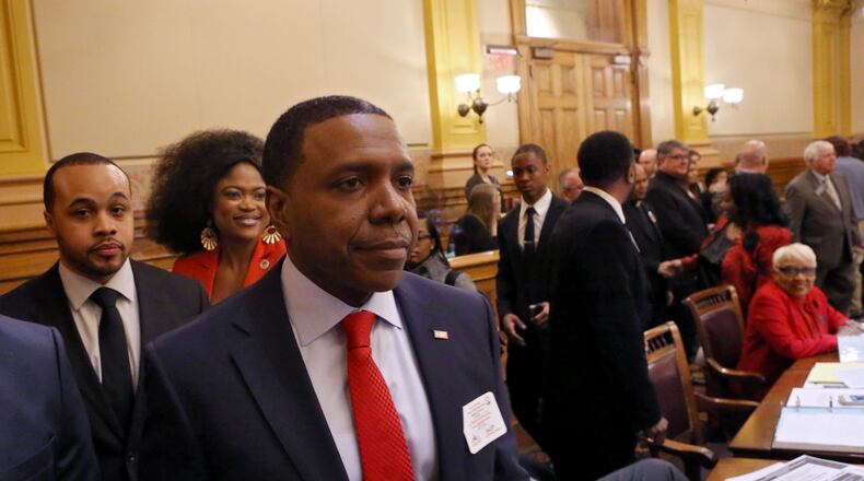 Feb. 4, 2016 - Atlanta - Rev. Creflo Dollar leaves the senate after being honored with a resolution. Rev. Creflo Dollar was the Chaplain of the Day in the House, and was honored with a resolution in the senate. His wife, Taffi Dollar, was the Chaplain of the Day in the Senate. BOB ANDRES / BANDRES@AJC.COM
