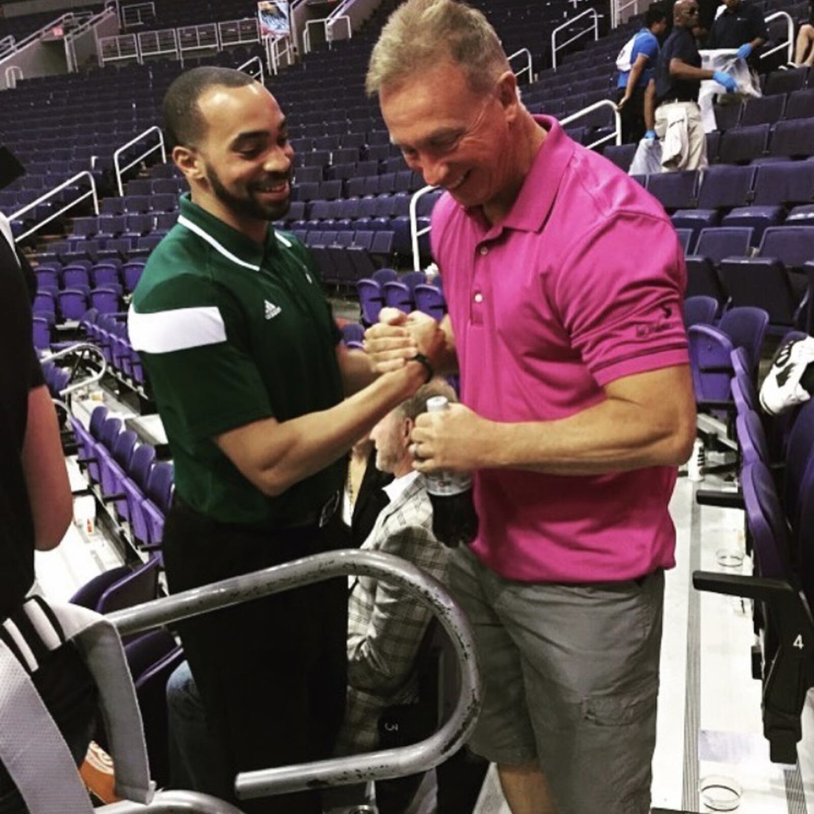 Lamar Skeeter (left) and his former Fairmont High School coach Hank Bias before an NBA game in Phoenix. Skeeter works for the Utah Jazz and will be inducted into the Fairmont Hall of Fame this weekend. CONTRIBUTED