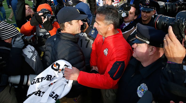 Jim Harbaugh of Michigan and Urban Meyer of Ohio State.