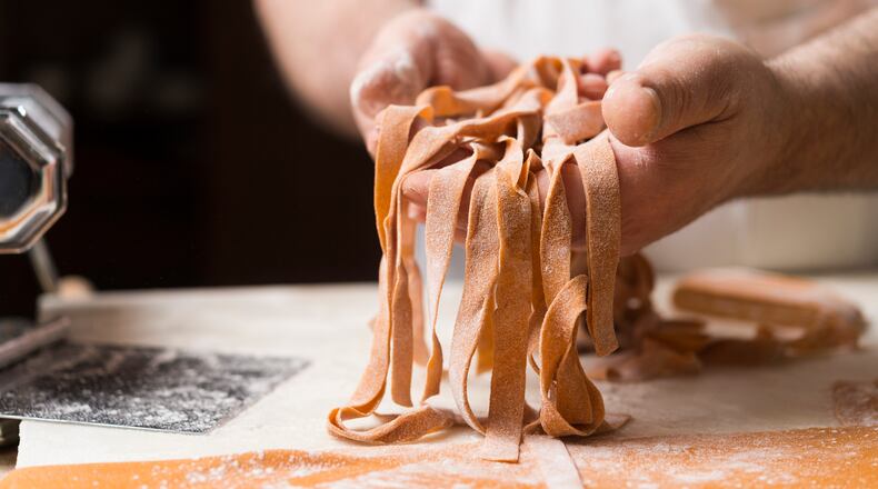 Hot pepper fettuccine with roasted butternut squash, in New York, Feb. 24, 2016. A mix of paprika, cayenne and pimento turns the fresh made pasta a rusty red.