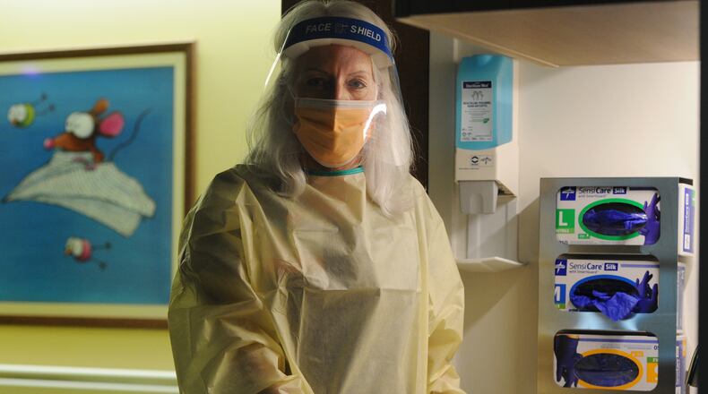 Karen Davis is a nurse in the Intensive Care Unit at Dayton Children's  Hospital. MARSHALL GORBY\STAFF