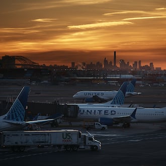 Planes are seen at Newark Liberty International Airport on Friday, Nov. 7, 2025, in Newark, N.J. (AP Photo/Andres Kudacki)