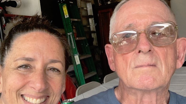 Artist Karen Fisher is pictured with her father who had Alzheimer’s. Their special relationship inspired her current art exhibit. CONTRIBUTED