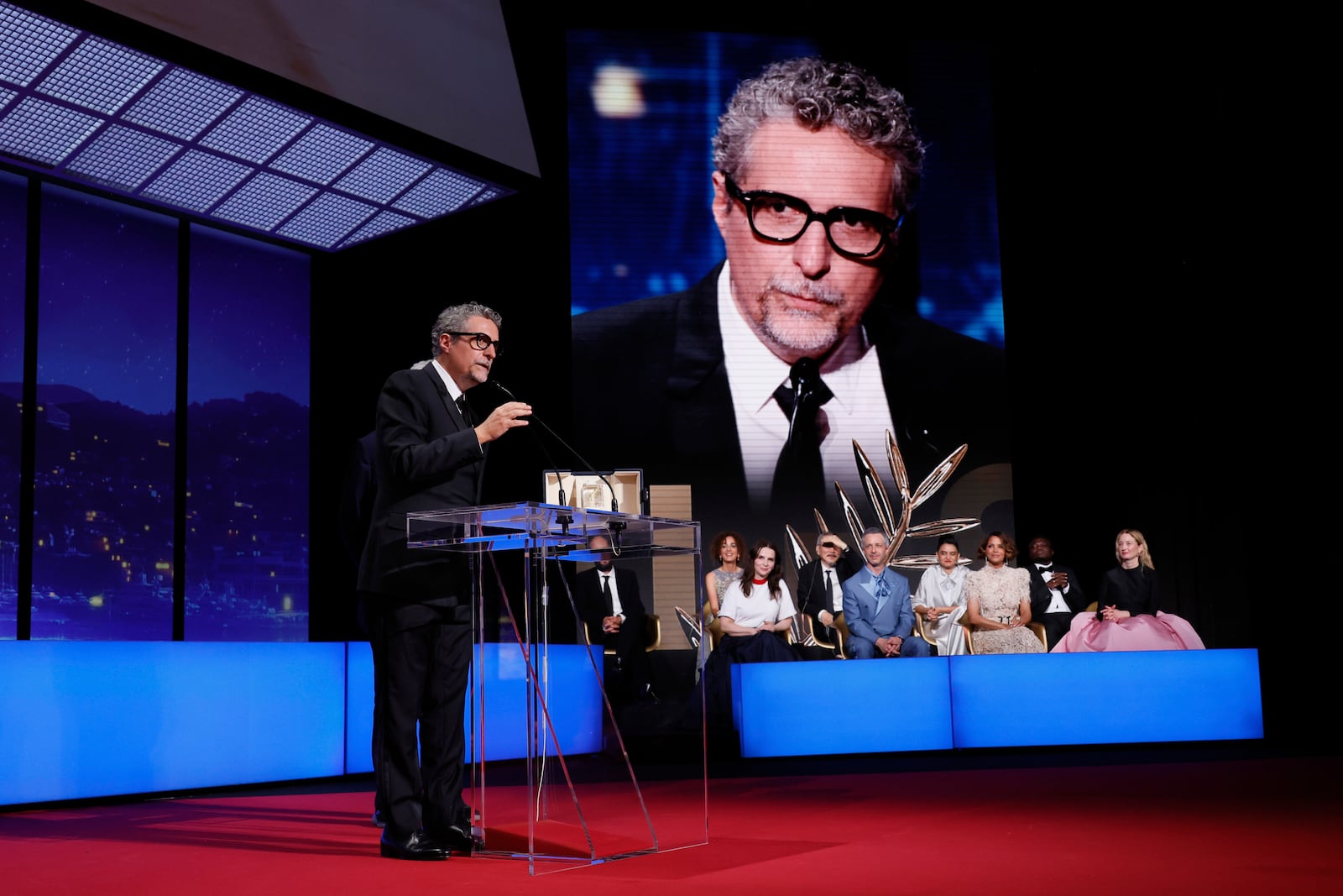 Director Kleber Mendonca Filho, accepts the award for best director for 'The Secret Agent', during the awards ceremony of the 78th international film festival, Cannes, southern France, Saturday, May 24, 2025. (Photo by Joel C Ryan/Invision/AP)