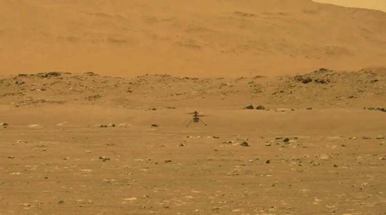 An image provided by NASA during the Ingenuity helicopter’s first flight on Mars, Monday, April 29, 2021, which lasted less than 60 seconds and reached a height of about 10 feet. The brief test of the experimental vehicle shows how explorers can study the red planet from the sky as well as the ground. (NASA via The New York Times)