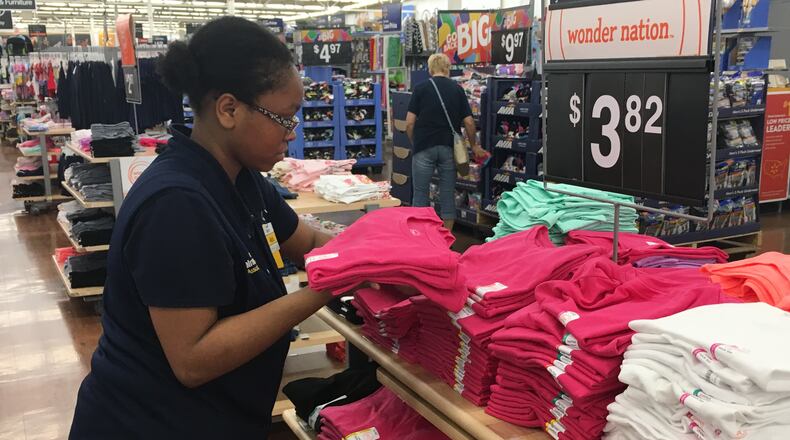 Walmart gave more than $200 million in bonuses, with more than $6.3 in Ohio. STAFF PHOTO / HOLLY SHIVELY