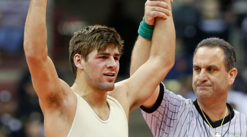 Kaleb Romero of Mechanicsburg celebrates a win over Josh Doherty of West Jefferson at 160 lbs. in Division III during the 79th annual OHSAA state wrestling tournament at the Jerome Schottenstein Center in Columbus on Saturday, March 5, 2016. (Barbara J. Perenic/The Columbus Dispatch)