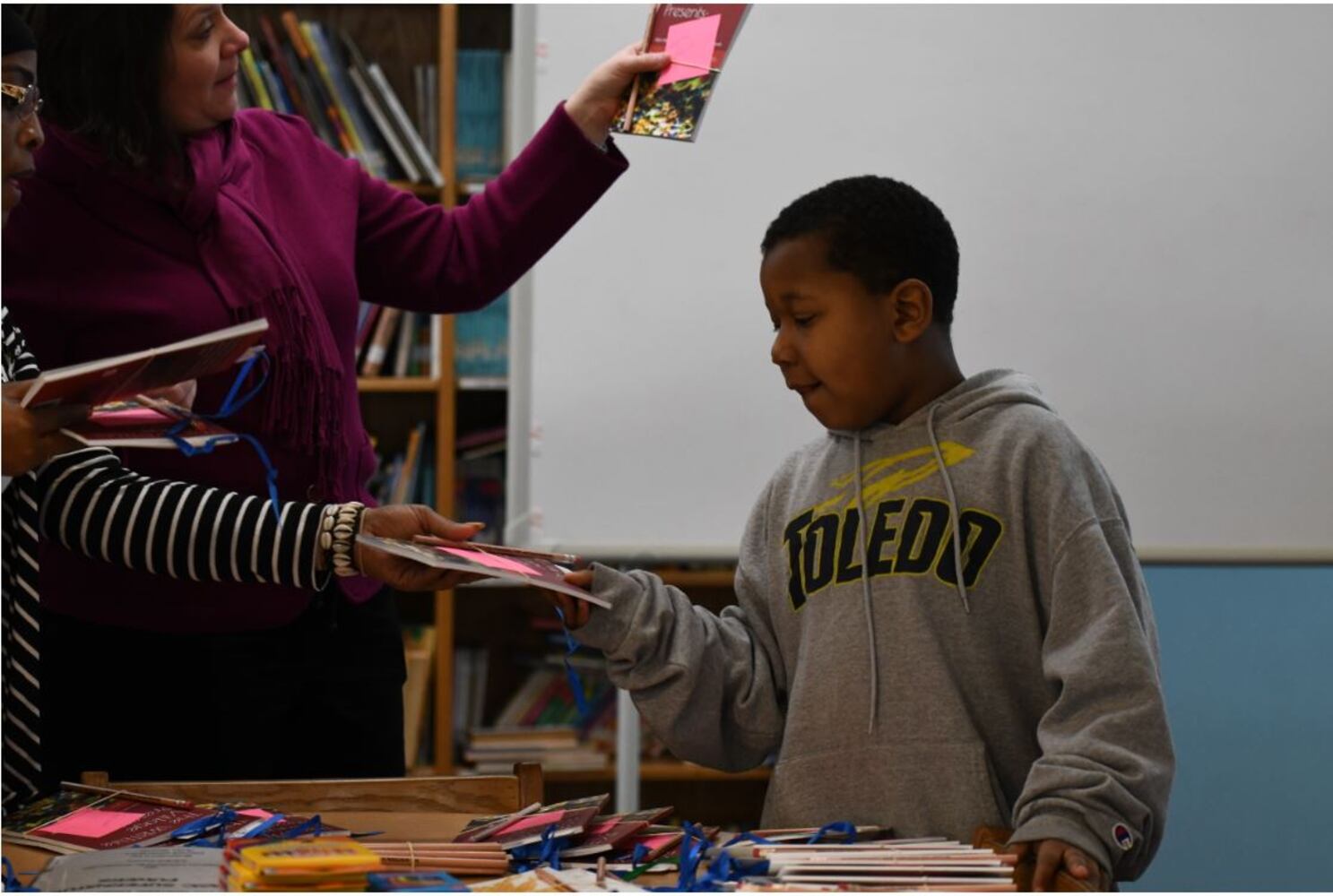 Photos: Dayton Strong! Kids receive copies of book they wrote about tornadoes