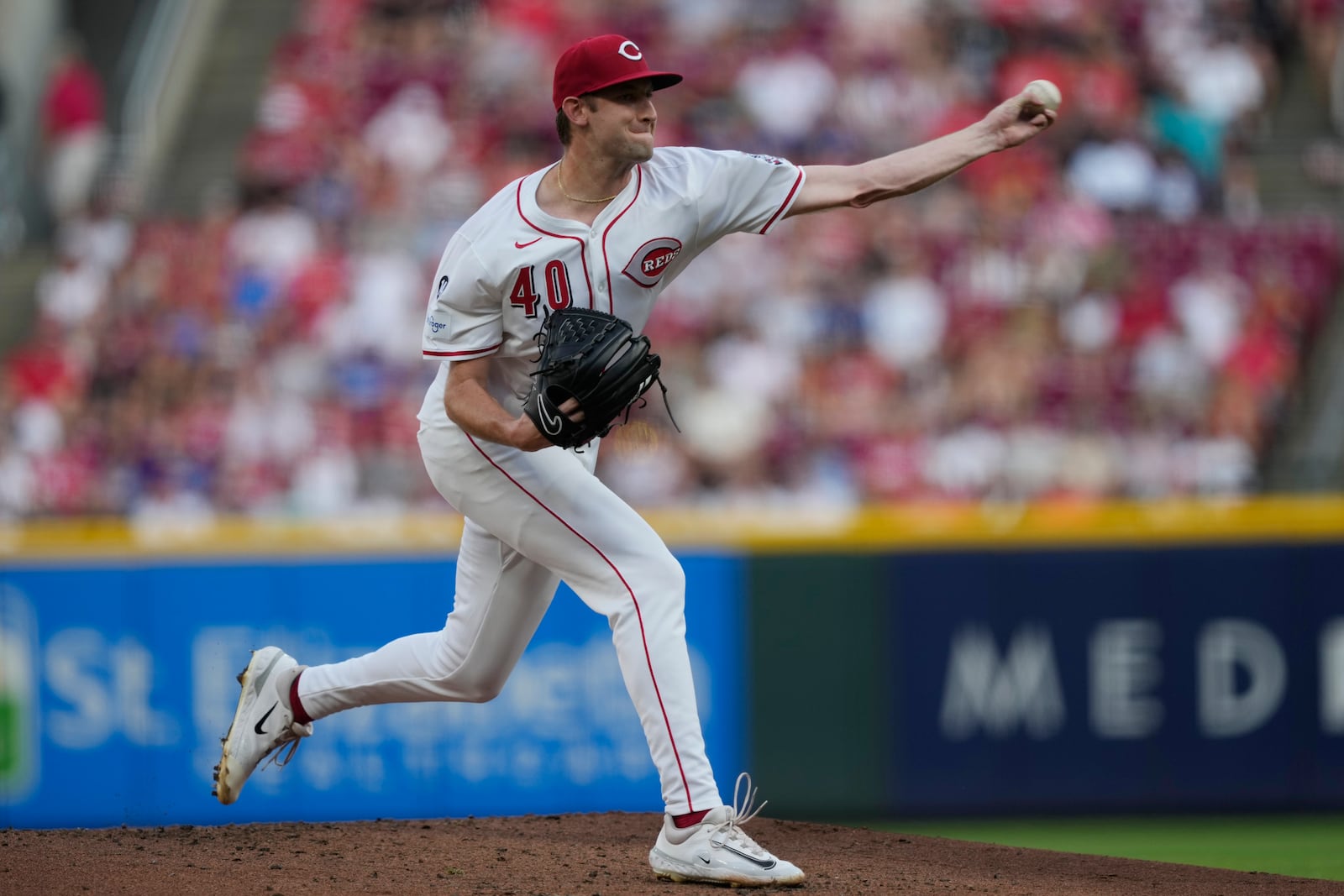 Cincinnati Reds pitcher Nick Lodolo throws during the first inning of a baseball game against the Los Angeles Dodgers, Tuesday, July 29, 2025, in Cincinnati. (AP Photo/Carolyn Kaster)