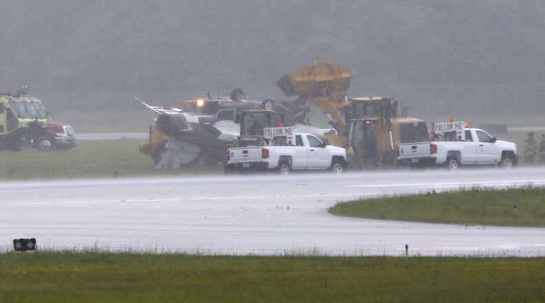 A Thunderbird flipped at the Dayton international airport on Friday, June 23. Ty Greenlees/Staff Photographer