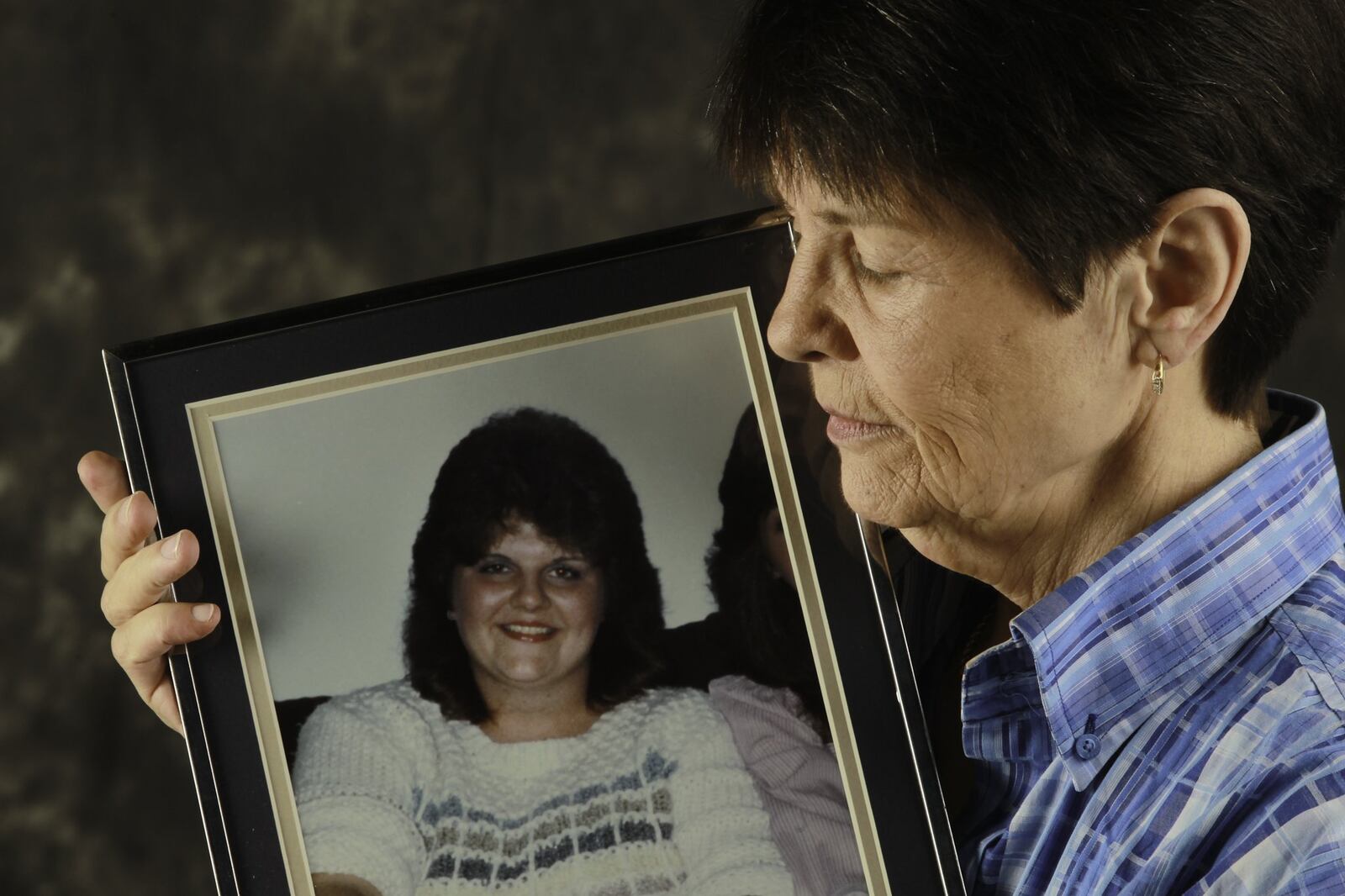 Becca Newcomb is still looking for answers as the 1987 killing of her sister, Melinda Newcomb, and two others in Preble County remains unsolved. CHRIS STEWART / STAFF