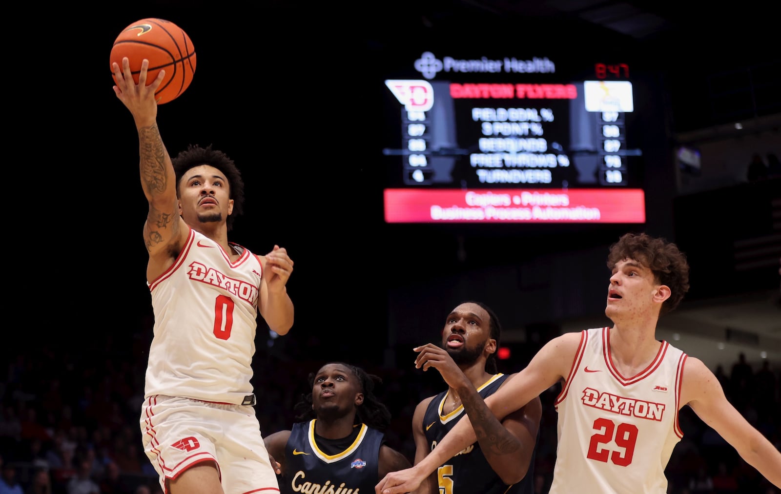 Dayton's Javon Bennett scores against Canisius on Monday, Nov. 3, 2025, at UD Arena. David Jablonski/Staff