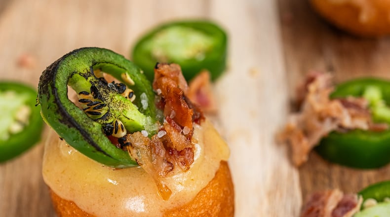 For National Donut Day on Friday, June 7, Death Grip Donuts has released 14 new creations including savory donuts. This brings their menu total to 32 three-bite donuts (Photo Courtesy: Shutter Steve Photography).