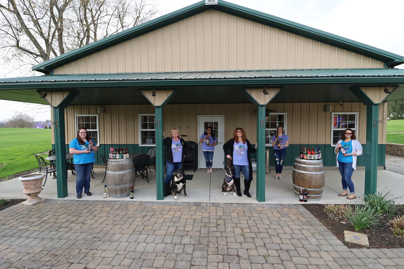 Workers at the Brandeberry Winery in Enon practice social distancing while preparing orders of wine. CONTRIBUTED PHOTO