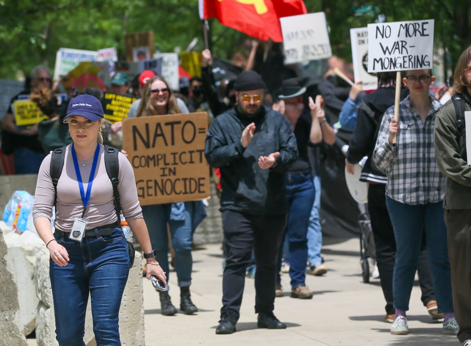 Digital Product Manager Sarah Cavender covering NATO protesters on May 25. STAFF / GREG LYNCH.