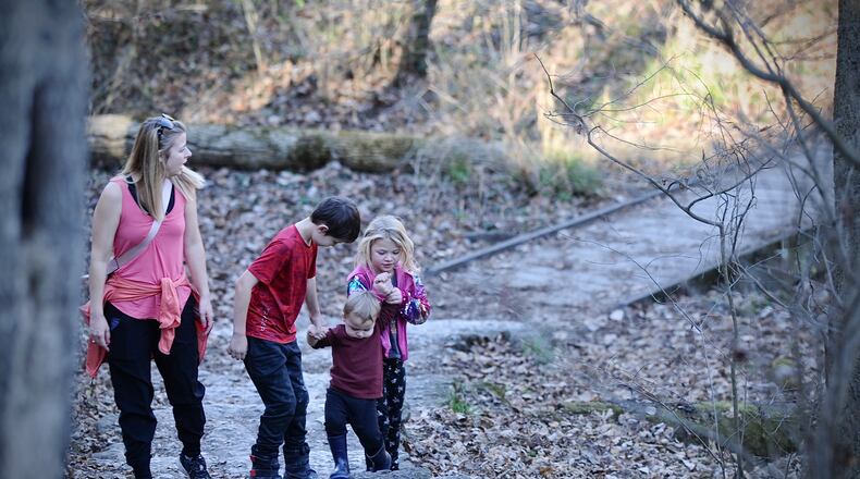 Larissa Smith and her children Maxwell, age 9, Samuel, age 1, and Alayna, age 6, traveled from Columbus to visit Glen Helen, Thursday, November 16, 2023. MARSHALL GORBY \STAFF