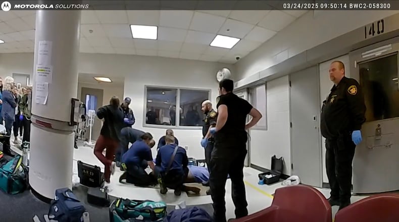 This image taken from video released by the Montgomery County Sheriff's Office shows law enforcement giving aid to Christian Black inside Montgomery County Jail on March 24, 2025 in Dayton, Ohio. (Montgomery County Sheriff's Office via AP)