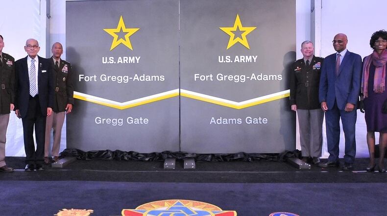 Col. James Hoyman, U.S. Army Garrison commander; retired Lt. Gen. Arthur J. Gregg; Gen. Charles R. Hamilton, commanding general, Army Materiel Command; Maj. Gen. Mark T. Simerly, commanding general, CASCOM and Fort Lee commanding general; and Stanley Earley III and Judith Earley, adult childrenn of Lt. Col. Charity Adams and Stanley Earley Jr., pose for pictures during the Fort Gregg-Adams Redesignation Ceremony April 27 at the Gregg-Adams Club. Army photo